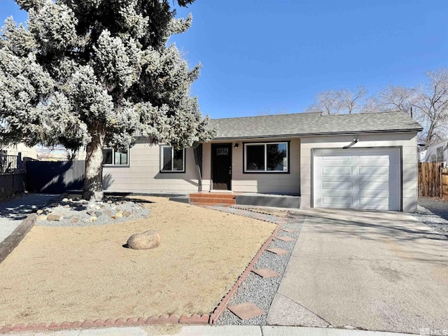 single story home featuring a garage