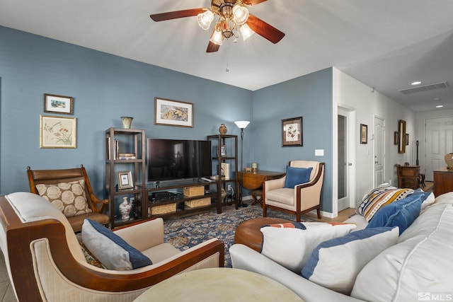 living room with ceiling fan