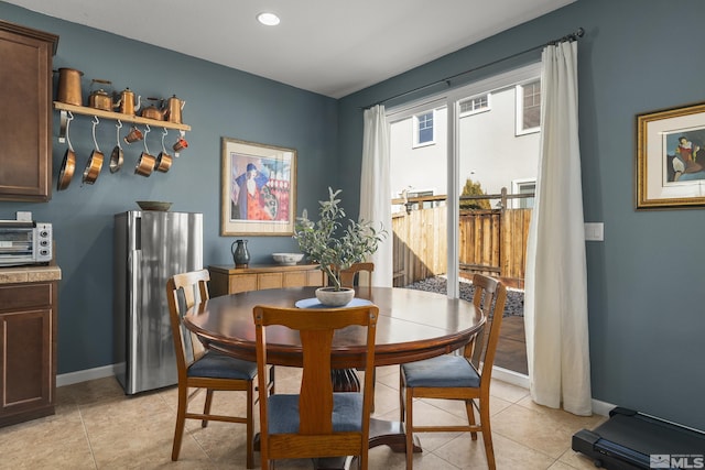 view of tiled dining room