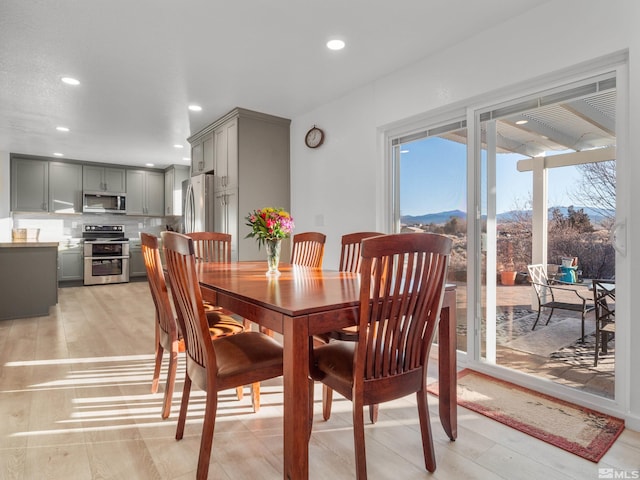 dining area with a mountain view