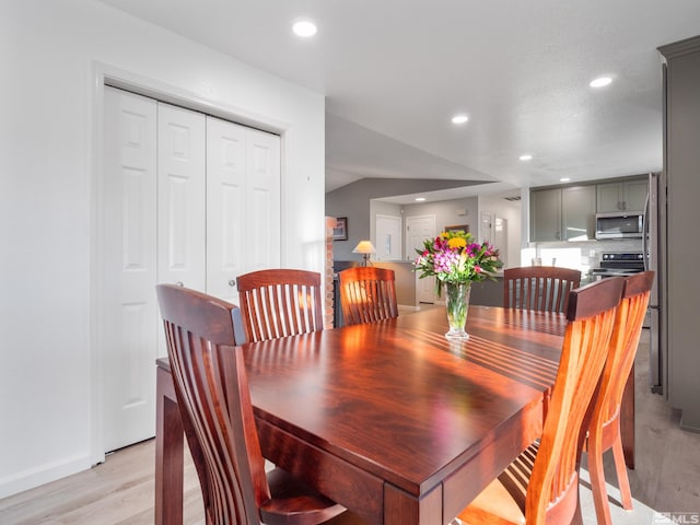 dining area with light hardwood / wood-style flooring