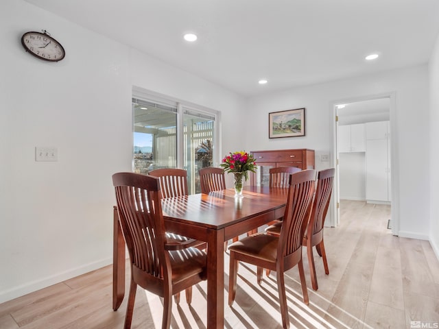 dining area with light wood-type flooring