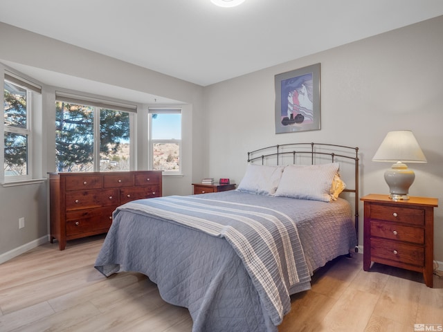 bedroom featuring light hardwood / wood-style floors