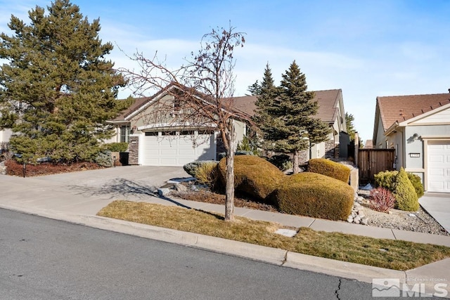 ranch-style home with a garage