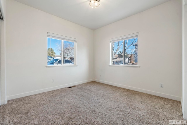 view of carpeted spare room