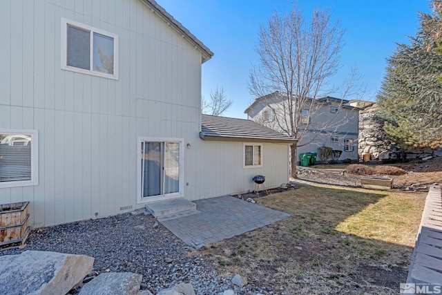 rear view of property with a patio area