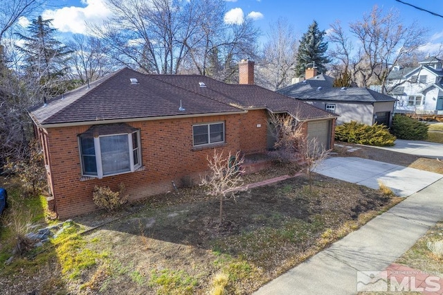 single story home with a garage