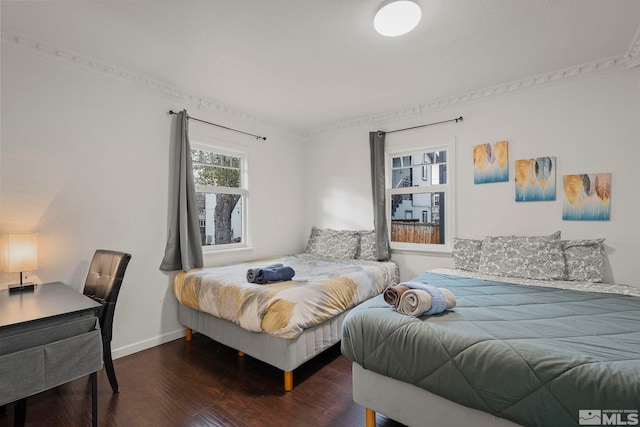 bedroom featuring dark hardwood / wood-style floors