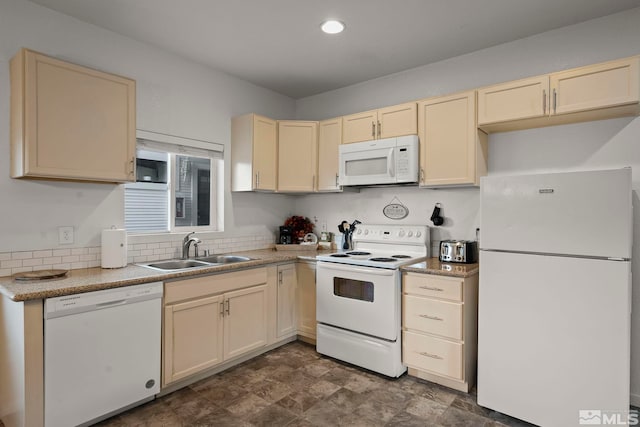 kitchen featuring sink and white appliances