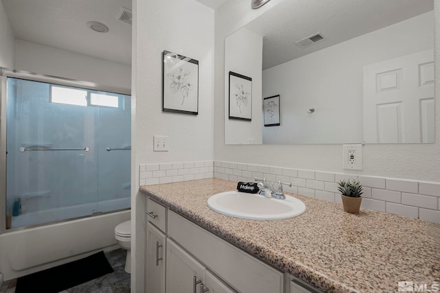 full bathroom with toilet, vanity, shower / bath combination with glass door, and decorative backsplash