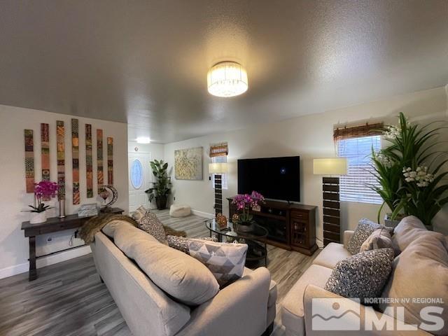 living room with hardwood / wood-style flooring