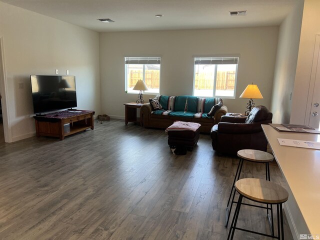 living room with dark wood-type flooring