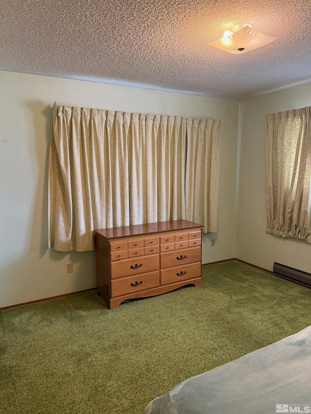 unfurnished bedroom featuring carpet flooring and a textured ceiling