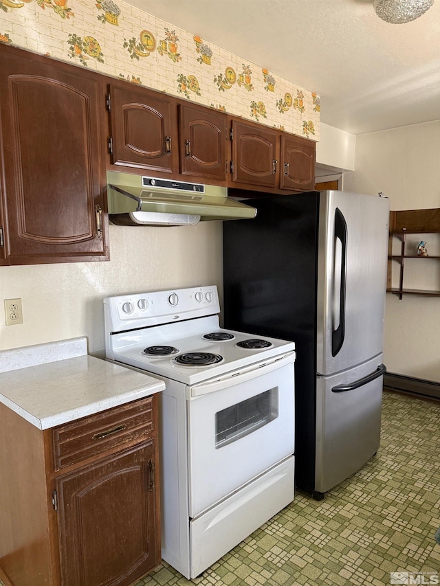 kitchen featuring white range with electric cooktop and dark brown cabinets