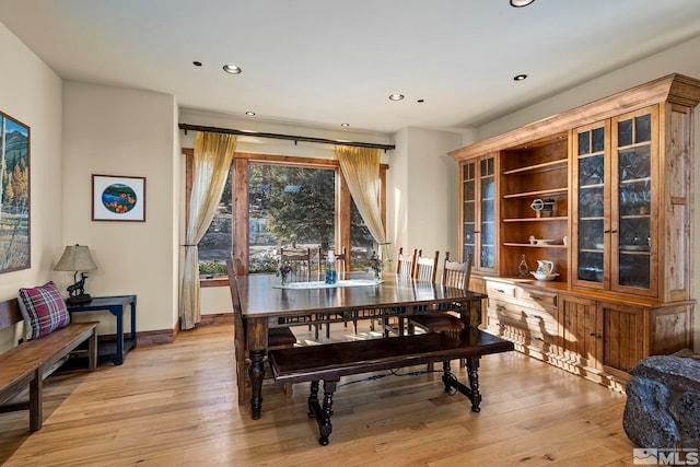 dining room with light wood-type flooring