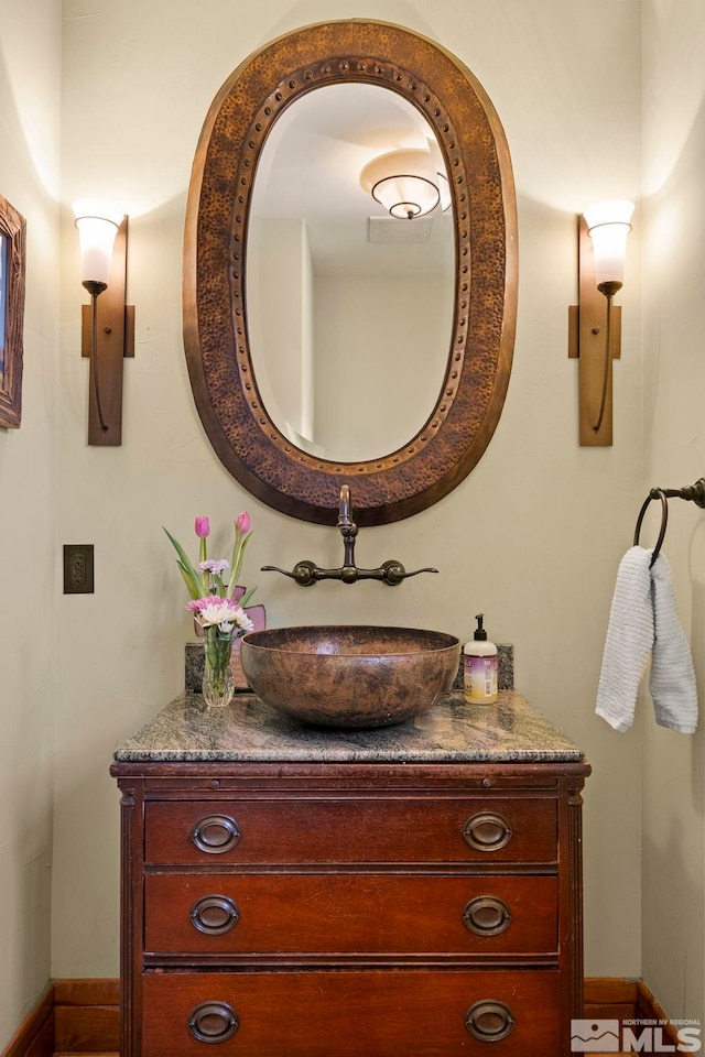 bathroom featuring vanity