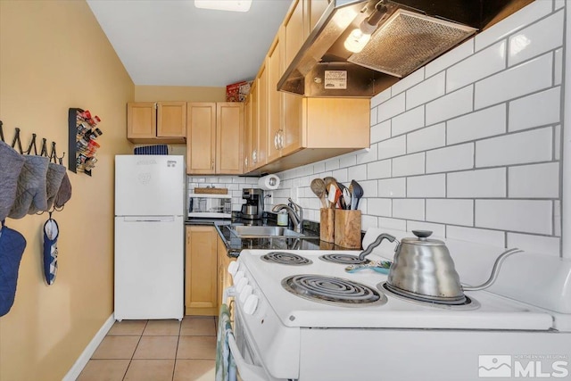 kitchen featuring light tile patterned flooring, light brown cabinetry, ventilation hood, white appliances, and decorative backsplash