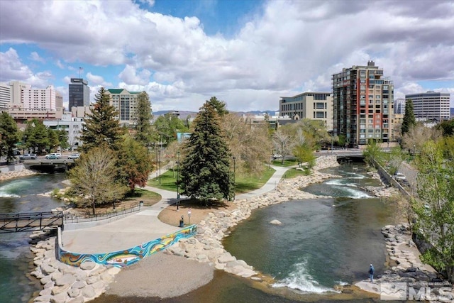 view of home's community featuring a water view