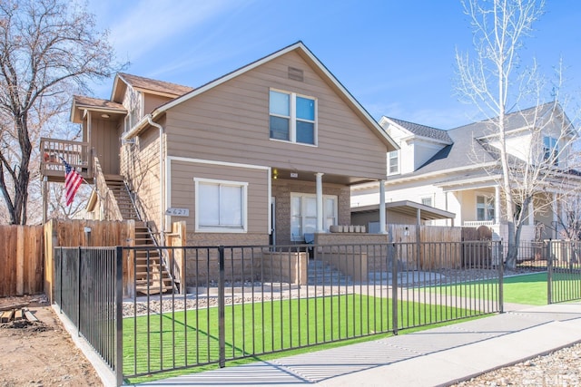 view of front of property with a front lawn