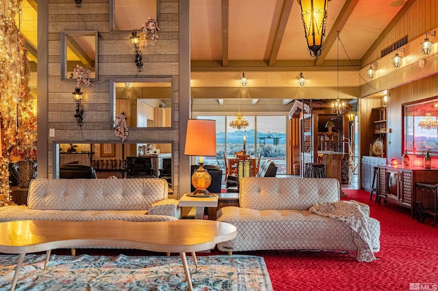 living room with carpet, wooden walls, high vaulted ceiling, and beam ceiling