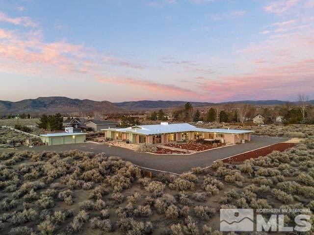 exterior space featuring a mountain view