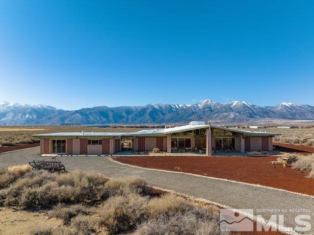 exterior space featuring a mountain view