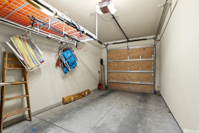 garage featuring a garage door opener