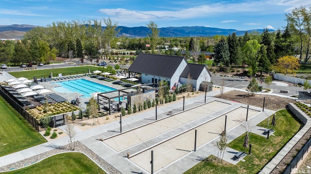 birds eye view of property with a mountain view