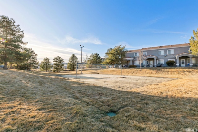 view of yard with volleyball court