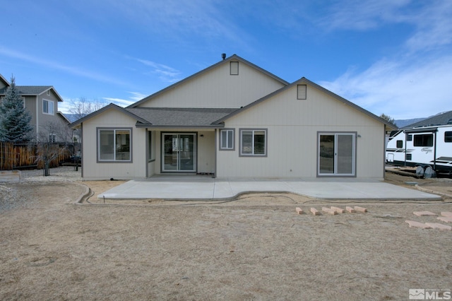 rear view of property featuring a patio