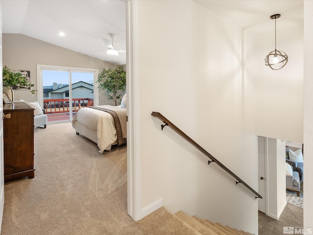 bedroom featuring lofted ceiling, access to outside, light colored carpet, and ceiling fan