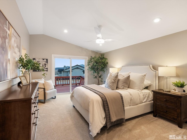 carpeted bedroom featuring lofted ceiling, access to exterior, and ceiling fan