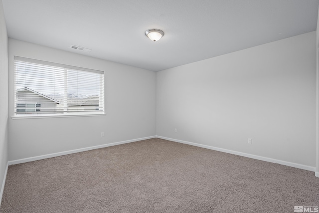 view of carpeted spare room