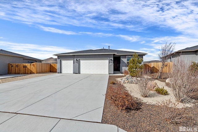 single story home with a garage