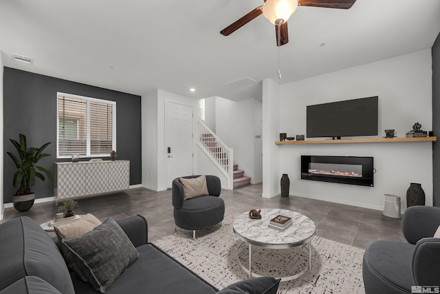 living room featuring ceiling fan