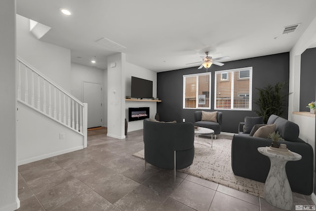 living room with ceiling fan