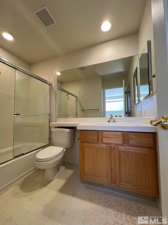 bathroom with visible vents, recessed lighting, vanity, and toilet