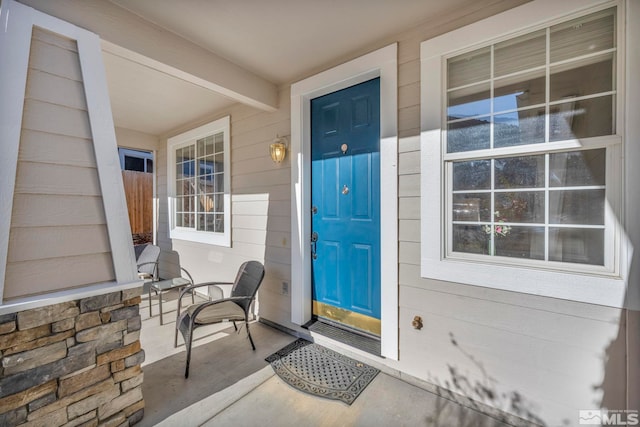 property entrance with a porch