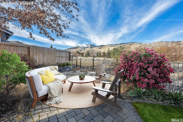 view of patio featuring a mountain view