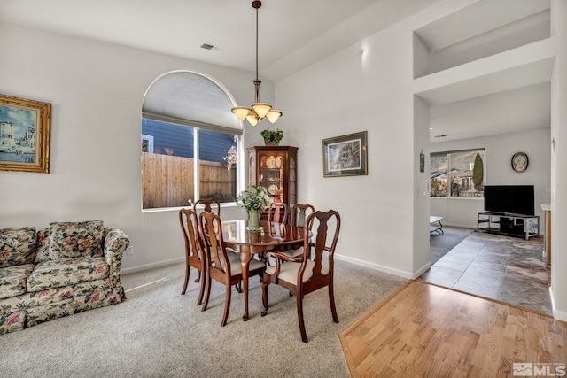 view of carpeted dining space