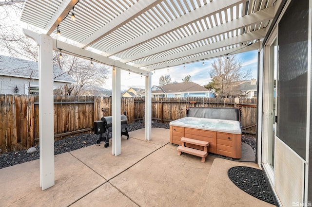 view of patio with a grill, a hot tub, and a pergola