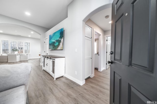 hall featuring light wood-type flooring