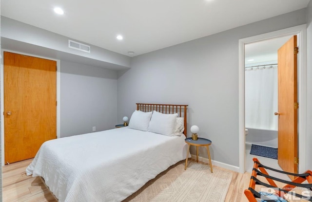 bedroom featuring light wood-type flooring