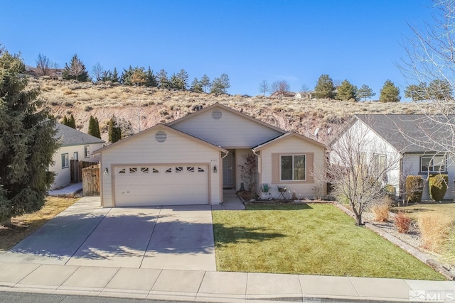 single story home featuring a garage and a front lawn