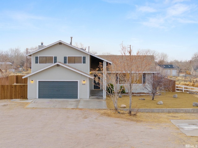 view of front of home with a garage