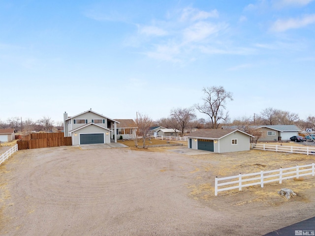 single story home featuring a garage