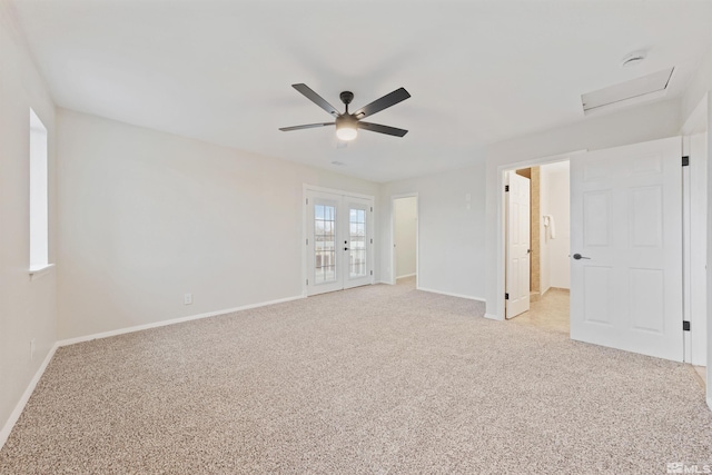 unfurnished room with french doors, light colored carpet, and ceiling fan