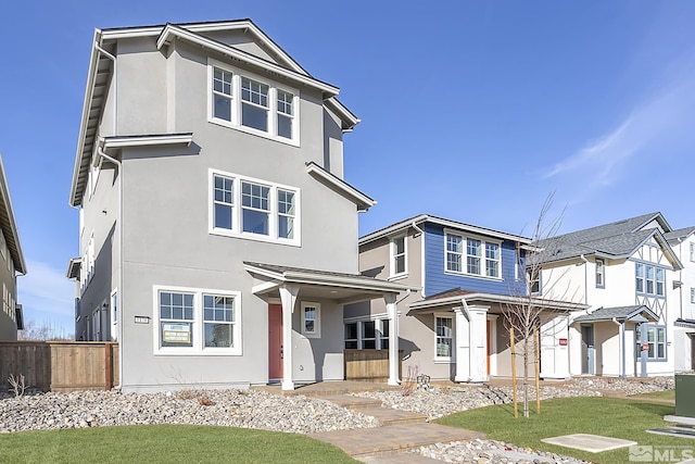 front facade featuring a front lawn