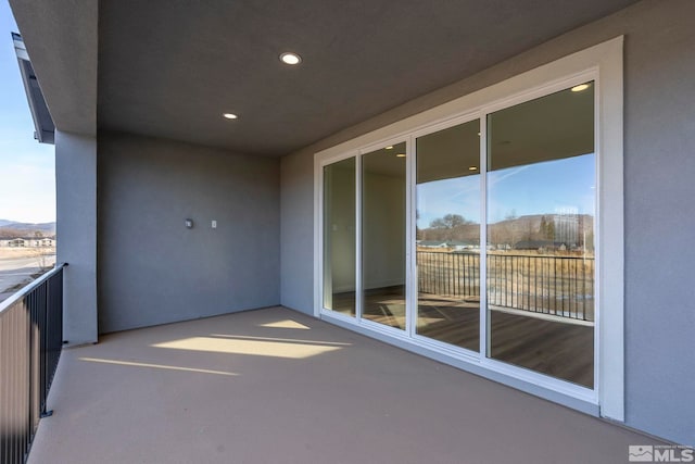 balcony featuring a mountain view