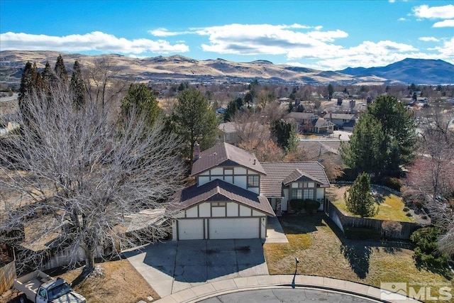 bird's eye view with a mountain view